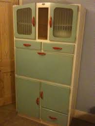The metal can easily be cleaned with a damp cloth so you can store anything from cleaning supplies, pantry items, or extra throws and board games. 14 Retro Kitchen Cabinet Ideas Retro Kitchen Cabinets Retro Kitchen Kitchen Larder