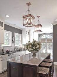 White Cabinets Grey Walls Neutral Backslash Dark Island Design By Carolina Design Associates Kitchen Inspirations Sweet Home Beautiful Kitchens