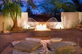 Costing well under $100, this square diy fire pit is a simple and stylish backyard design element constructed from cement wall blocks laid in a bed of sand. 50 Gorgeous Fire Pit Ideas Hgtv
