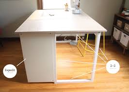Fun diy home office ideas painting this large tanker metal desk in a fun teal color really added a pop of color to this diy home office. Custom Diy Sewing Cutting Table Noodlehead