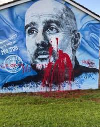 Pep Guardiola's mural has been vandalised ahead of today's Manchester  derby. 👀