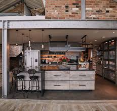 If you are willing to try something new but you are not so brave you can dress a part of your home in industrial style. Industrial Kitchens The Main Company