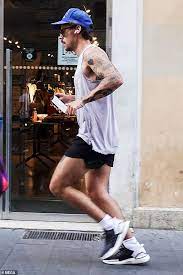 With his new mustache on full display. Harry Styles Debuts A Very Different Look As He Sports A Moustache While Out Jogging Through Rome Readsector