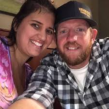 A manhunt is currently underway in northwest Arkansas following the tragic  killing of a married couple who were hiking with their two young daughters  at Devil's Den State Park. The victims have