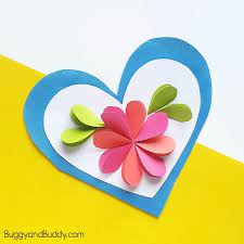 Sometimes making a cute card is as simple as… taping something to the front. Homemade Heart And Flower Card Craft For Kids Buggy And Buddy