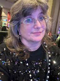 what hairstyle suits a 60 year old woman with natural colored hair?