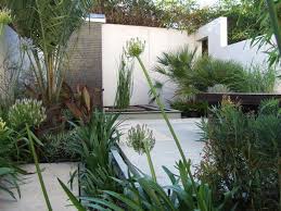 A Beautiful Garden By Day Contemporary Garden Design Garden Design Plans Garden Design