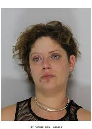 Woman charged with OUI after crash