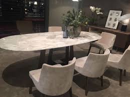 Again, setting the kitchen at a different height to the dining space is another idea. A Trip Into The World Of Stylish Dining Tables