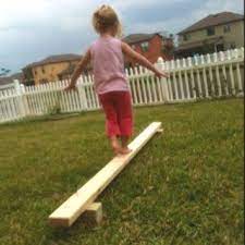 Quick Balance Beam For Kids One 2x4 And Two Pieces Of 4x4 Put Together With Nails Sand To Get Rid Of Kids Playground Gardening For Kids Kids Obstacle Course