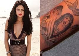 9 bible phrase above her thigh. 45 Selena Gomez Tattoos With Meanings That Show Your Love For The Star Wild Tattoo Art