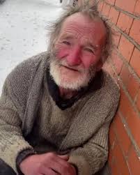 elderly man helps freezing mother and baby