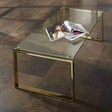 Drinking coffee is not only about enjoying coffee, but it's also about how this drinking coffee event is prepared. Joyce Coffee Table Rectangular In Clear Glass With Gold Legs Gold Glass Coffee Table Coffee Table Gold Coffee Table