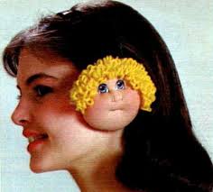 Wha?! 1984 Cabbage Patch Kid earmuffs. Nothing like a creepy baby face  growing out of the side of your head. #80skid #80sfashion #winterclothes  #80stoys #genx