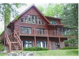 Homesforsaleinaitkin Com Located In Aitkin Mn This Picturesque Log Home Includes 3 Bedrooms 3 Bathrooms Guest House With Lake House House Styles Log Homes