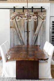 All of this recycled wood furniture is individually bench made and finished to order. Dining Room Barn Door On Rails Transitional Dining Room