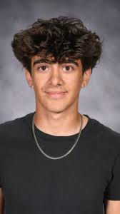 Can someone make the boy showing his tongue, smiling instead, thank you