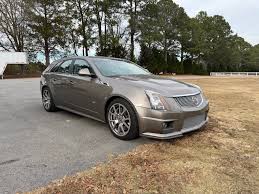 Image result for Mocha Steel 2012 Cadillac