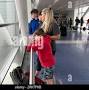 Profile Picture of Mitzi Hale and her three sons look out a window at backed-up traffic due to ... (@alamy.com) on Google