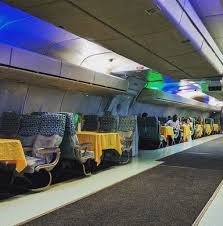 The Accra Restaurant That S Inside An Airplane Accra Unique Restaurants First Class Seats