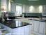 White Kitchen Cabinets With Black Granite Countertops Images