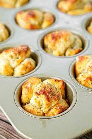 Using your hands (or a knife for extra precision), tear each piece of biscuit dough into first time having monkey bread. Parmesan Garlic Monkey Bread Muffins Plain Chicken