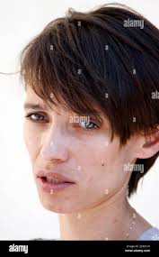 3-year-old daughter Elise as she arrives with her father, Frenchman  Jean-Michel Andre in Marseille, southern France