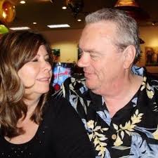 Lady in Red by Chris de Burgh. It's in Working Girl and I associate it with  Alec Baldwin having a temper tantrum when Melanie Griffith turns him down.  “Who died and made