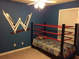 Wwe bedroom kids bedroom sonny boy hanging canvas daughters room babies r us christmas 2015 where the heart is our baby. Wrestling Ring Bed And Freehand Painted Emblem Amazing Wwe Bedroom Wwe Bedroom Decor Room Ideas Bedroom