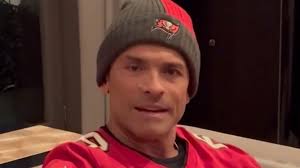 Kelly Ripa boos Mark Consuelos and makes sly dig in video at NYC home as he  insists 'I'm going to pull through!'