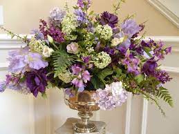 Silk or dried flowers are also an option, and they give the added advantage of never wilting or dying. Pin By Helga K On Wedding Fake Flower Arrangements Church Flower Arrangements Silk Flower Arrangements