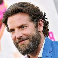Let Bradley Cooper S Beard Teach You A Few Things About Personal Grooming Bradley Cooper Hair Long Hair Styles Men Wavy Hair Men