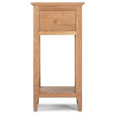 Henley is a circular, natural oak dining table that'll soften your room with its curves. Henley Oak Collection Oak Living Dining Furniture Alexander Ellis