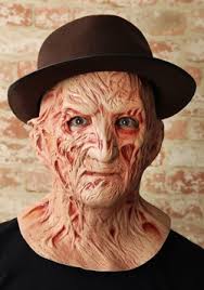This design is on a womens fit t shirt and features a htv design along with slash marks all the way through the back of the shirt to simulate freddys blades ripping the shirt. Freddy Krueger Costumes Masks Halloweencostumes Com