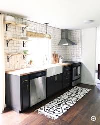 Dark Grey Lower Cabinets Open Shelves Straight Herringbone Tile Backsplash Kitchen Remodel Home Decor Kitchen Backsplash