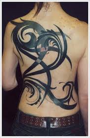 Tribal tattoos and designs on upper back of a. 35 Tribal Back Tattoo Designs