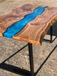 Often caused by inaccurate measuring, not mixing thoroughly or by curing in cold temperatures. Resin River Dining Table Rooso Designs