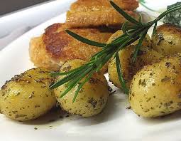 Find The Perfect German Side Dish For Your Roast Beef Or Wienerschnitzel German Rosemary Garlic Potatoes Unbeat Potatoe Salad Recipe Recipes Garlic Potatoes