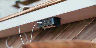 Look again…they're hidden under the counter! Under Desk Edge Mount Power Outlets Power Grommets Mockett