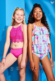 In the video, children's swimwear for girls, swimming trunks and shorts for boys, as well as bikinis and other beachwear. Pin On Justice Swimwear
