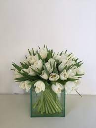 This video will teach you how to arrange tulips 5 different ways…or read below for the written tutorial. Centerpiece Option 3 Modern Tulip Twist In Two Sizes Large Size Shown White Flower Arrangements Fresh Flowers Arrangements Modern Flower Arrangements