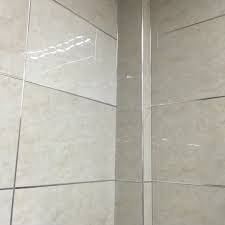 So now we've got an ugly looking edge to the tile (our cuts weren't very clean — we assumed we would cover them after). Tile Trim On Twitter Aluminium Tile Trim Hide And Protects The Exposed Raw Edge Of Tiles And Creates A Neat And Professional Finish