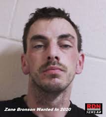 Update: Cochrane RCMP Arrest Two After Break-Ins One Suspect Found In The  Doghouse ** Cochrane, AB