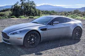Image result for Lightning Silver 2007 Aston Martin
