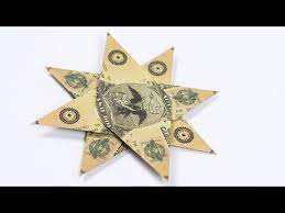 Like all money origami projects, you'll get the best results from your ninja stars if you have crisp this is probably the easiest five point origami star in existence! Diy Easy Money Origami For Beginners How To Fold Shirt From Dollar Bill Funny Dress Tutorial Origami Christmas Star Christmas Origami Dollar Origami
