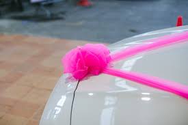 Wedding cars decorated with a sign of marriage and also refers to the love for the bride groom. Wedding Car Wedding Decoration On Wedding Car Luxury Wedding Car Decorated With Flowers Just Married Sign And Cans Attached Stock Photo Adobe Stock