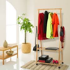These wooden garment racks are very versatile and keep any clothing retail space from becoming stale. China New Design Free Standing Metal Wood Heavy Duty Clothes Rail Garment Display Stand Clothes Rack China Clothes Rack Price