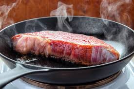 Larger steaks will admittedly fit better on a grill, but you can cut them into smaller portions to fit into your skillet.5 x research source. Best Methods To Cook A Steak Indoors