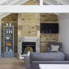 The small spaces that flank the length of the stone fireplace get an uplift with dark gray walls. 41 Grey Living Room Ideas In Dove To Dark Grey For Decor Inspiration