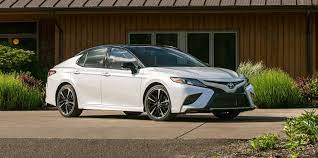 The camry sedan features a sporty, aggressive front end with a large grille. 2020 Toyota Camry Review Pricing And Specs